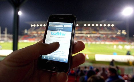 NEWCASTLE, AUSTRALIA - JULY 11: In this photo illustration the Twitter website is displayed on a mobile phone at a NRL match on July 11, 2009 in Newcastle, Australia. The micro-blogging phenomenon sees users post text 'tweets' of upto 140 characters in response to the question 'What are you doing?'. (Photo by Cameron Spencer/Getty Images)
