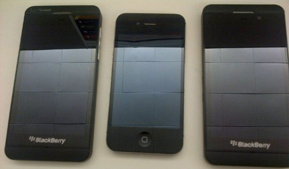 the upcoming blackberry z10 gets torn apart poses next to the iphone-1