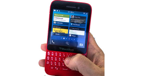 unannounced blackberry r10 poses for the camera in red and white-logo